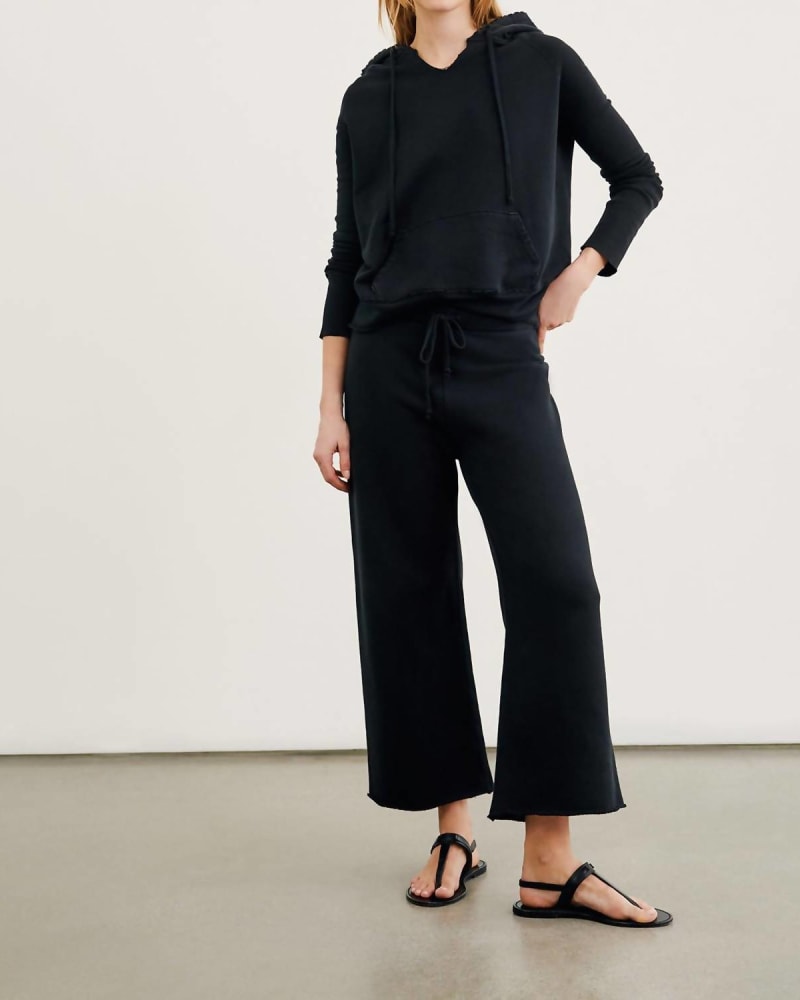 Front of a model wearing a size XL Kiki Sweatpant In Washed Black in Washed Black by NILI LOTAN. | dia_product_style_image_id:360163